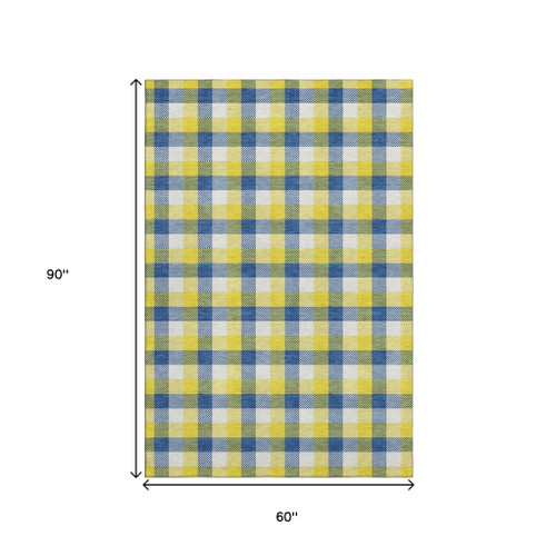 5' X 8' Yellow Navy Blue And Ivory Plaid Washable Area Rug With UV Protection