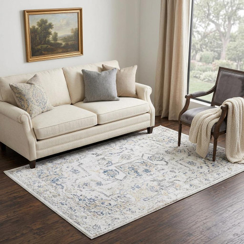 5' X 8' Beige Blue Gray And Rust Medallion Area Rug