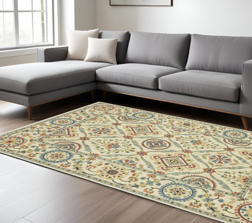 7' X 10' Ivory Blue And Orange Oriental Area Rug With Fringe