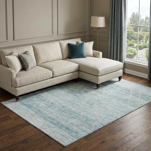 9' X 12' Teal Beige And Ivory Abstract Geometric Washable Area Rug With UV Protection