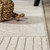 5' Ivory And Cream Round Striped Indoor Outdoor Area Rug