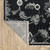 7' X 10' Blue Black And Ivory Floral Area Rug With Fringe
