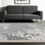 5' X 7' Gray White And Brown Abstract Washable Area Rug With UV Protection