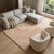 8' X 11' Beige Orange And Brown Geometric Washable Area Rug With UV Protection