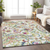 10' X 14' Ivory Blue And Pink Paisley Washable Area Rug With UV Protection