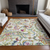 10' X 14' Ivory Blue And Pink Paisley Washable Area Rug With UV Protection