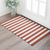 3' X 5' Red And Ivory Striped Washable Area Rug With UV Protection