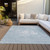 9' X 12' Sky Blue And Denim Blue Abstract Washable Indoor Outdoor Area Rug