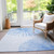 9' X 12' Denim Blue And Ivory Abstract Washable Indoor Outdoor Area Rug