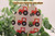 Red & Green Tractors Teardrop Faux Leather Earrings | Hypoallergenic