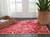 3' X 4' Red And Ivory Abstract Indoor Outdoor Area Rug