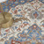 4' X 6' Ivory Tan and Blue Floral Medallion Non Skid Area Rug