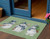 3' X 5' Artichoke Green Denim Blue And Ivory Snowmen Washable Indoor Outdoor Area Rug