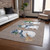 10' X 14' Taupe Denim Blue And Ivory Snowmen Washable Indoor Outdoor Area Rug