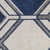 7' X 10' Ivory and Blue Geometric Indoor Outdoor Area Rug