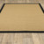 6' X 9' Beige and Black Indoor Outdoor Area Rug
