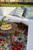7' X 10' Green And Ivory Floral Indoor Outdoor Area Rug