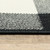 7' X 10' Black and Ivory Indoor Outdoor Area Rug