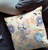 20" X 20" Off White And Orange Broadcloth Floral Throw Pillow