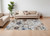 7' X 10' Ivory Red and Blue Floral Power Loom Area Rug