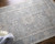 10' X 14' Gray Blue and Taupe Abstract Hand Woven Distressed Area Rug With Fringe