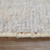4' X 6' Ivory Tan and Blue Floral Hand Woven Distressed Area Rug With Fringe