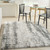 4' X 6' Charcoal and Ivory Abstract Shag Area Rug