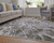 8' X 11' Taupe and Gray Abstract Power Loom Area Rug With Fringe