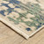 10' X 13' Beige And Green Abstract Area Rug With Fringe