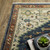 2' X 3' Blue Ivory And Orange Oriental Area Rug With Fringe