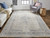 4' X 5' Gray Blue and Taupe Oriental Power Loom Worn Faded Area Rug With Fringe