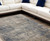 7' X 10' Beige and Blue Abstract Power Loom Distressed Area Rug