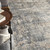 7' X 10' Beige and Blue Abstract Power Loom Distressed Area Rug