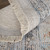 9' X 12' Ivory Blue and Orange Oriental Hand Woven Distressed Area Rug With Fringe