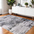 5' X 8' Gray Ivory and Taupe Abstract Power Loom Worn Faded Area Rug