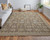 6' X 9' Tan and Brown Wool Oriental Hand Knotted Area Rug With Fringe