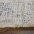 9' X 12' Tan and Gray Oriental Hand Woven Distressed Area Rug With Fringe