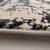 7' X 10' Black Gray and Beige Abstract Area Rug