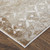 5' X 8' Tan and Ivory Abstract Power Loom Worn Faded Area Rug