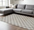 7' X 10' Beige and Brown Checkered Power Loom Area Rug