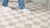 7' X 10' Beige and Brown Checkered Power Loom Area Rug