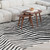 5' X 8' Cream and Black Abstract Distressed Area Rug