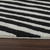 5' X 8' Cream and Black Abstract Distressed Area Rug