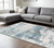 5' X 8' Ivory Blue And Brown Abstract Area Rug With Fringe