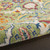 4' Green Yellow Blue and Red Round Floral Power Loom Area Rug