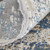 8' X 11' Ivory Tan and Blue Abstract Power Loom Area Rug With Fringe