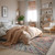 8' X 11' Cream Celestial Burst Abstract Area Rug