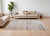 8' X 10' Ivory and Tan Abstract Power Loom Worn Faded Area Rug