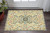 3' X 5' Ivory Blue And Burnt Orange Oriental Area Rug With Fringe