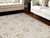 8' X 10' Cream Floral Power Loom Distressed Area Rug With Fringe